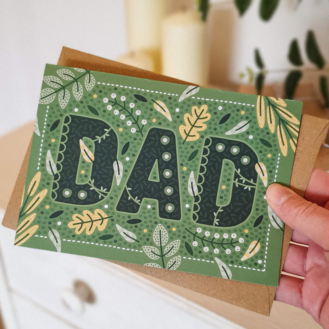 Hand holding Green botanical leaves natural Father's Day card UK Unique green illustrated Father's Day card Printed on recycled card Supplied with kraft brown recycled envelope