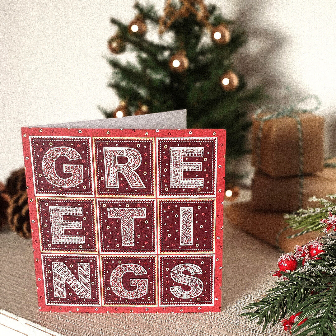 Greetings traditional Christmas card Kraft Brown recycled envelope Unique typographic Christmas card design