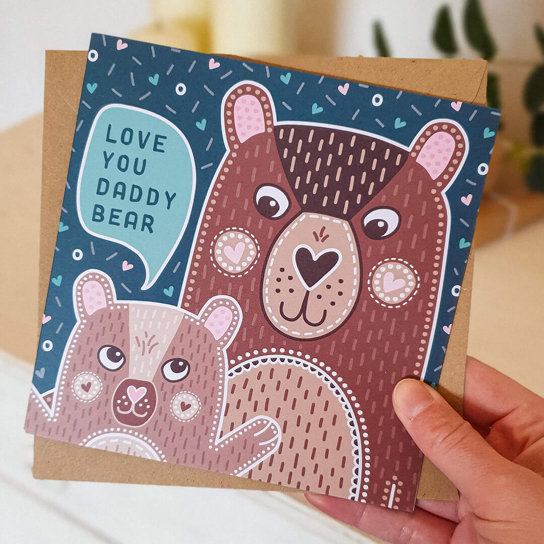 Hand holding Love You Daddy Bear Cute Father's Day card Cute illustrated bear design Printed on recycled card Supplied with kraft brown recycled envelope