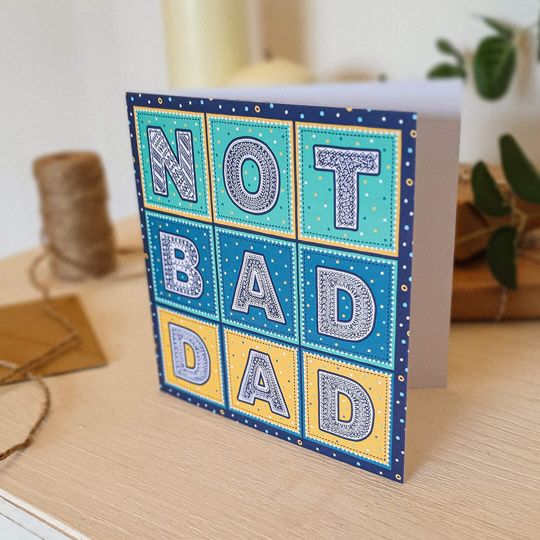 Not Bad Dad funny Father's Day card Kraft Brown recycled envelope Bright colourful typographic funny card for Dad