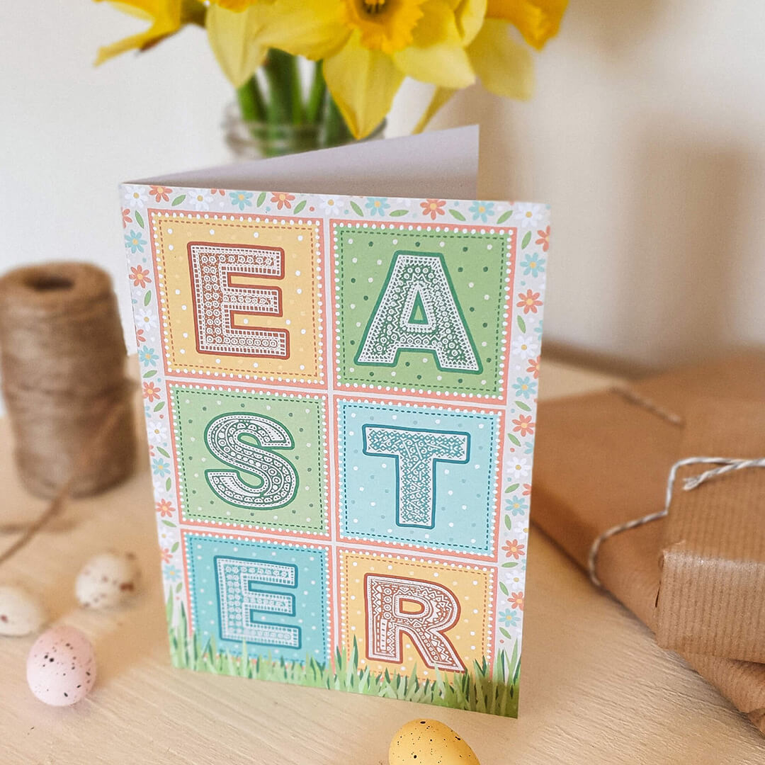 Pastel Typographic Happy Easter card Printed on recycled card Spring-time colours and floral illustrations Easter card