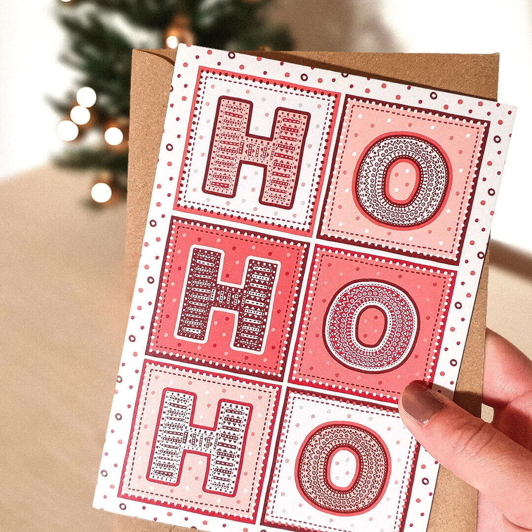 https://jessalittlecreative.com/cdn/shop/products/typographic-ho-ho-ho-christmas-card-with-envelope-jess-a-little-creative.jpg?v=1656513527&width=1445