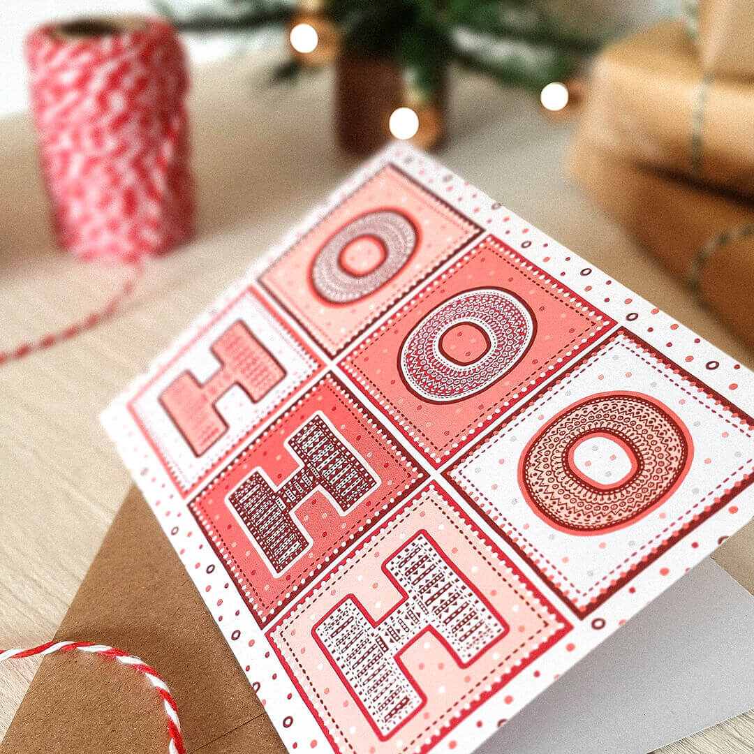 Red white Unique Ho ho ho Christmas card Bold red unique typographic Christmas card design Printed on recycled card Kraft brown recycled envelope