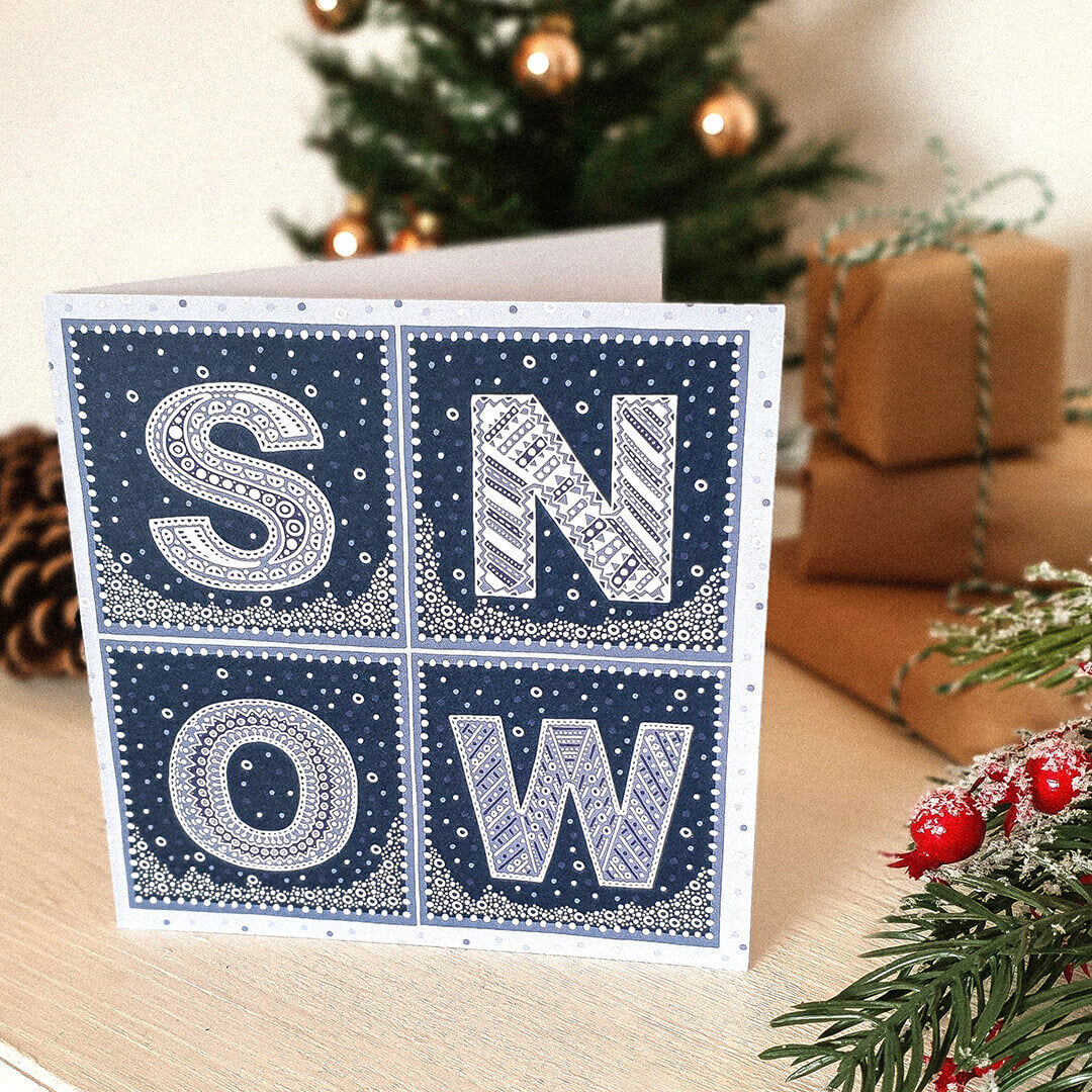 Typographic Snow Christmas card Kraft Brown recycled envelope Unique typographic blue white Snow Christmas card design